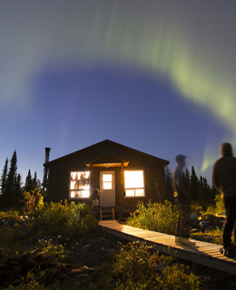 A camp and an aurora borealis.